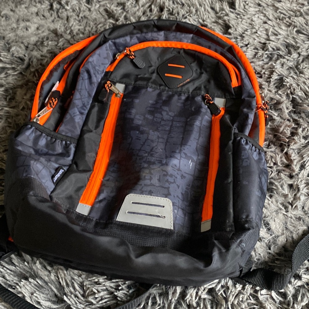 Orange and black backpack